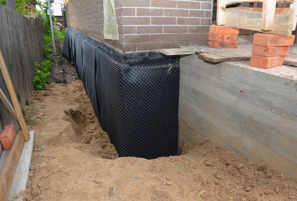 SJ Waterproofing Pros technician performing targeted Crawl Space Encapsulation assessment in Randolph, WI